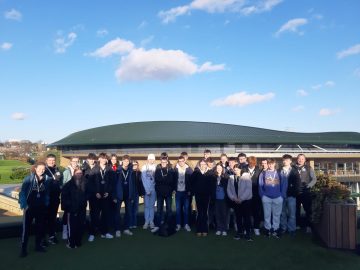 Alton's Sports students pose for a photo at Wimbledon Tennis Centre.