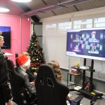 Students preparing to race each other in Mario Kart Wii at Winterfest.