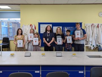 Havant Chemistry Olympiad participants with their certificates.
