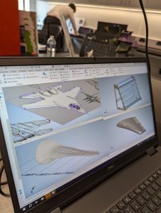 A laptop screen showing a design for a 3D Printed F-14 Tomcat.