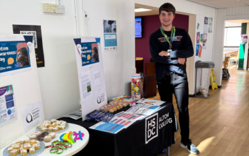 Theo standing next to his stall.