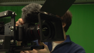 A camera on set of the video.
