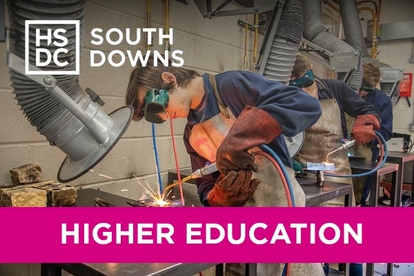 a student working in engineering workshop wearing protective eyewear