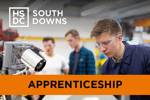 Men wearing protective eyewear while using machinery