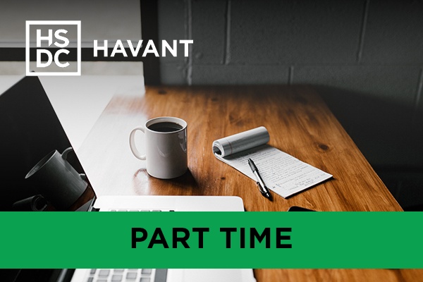 a laptop, pen, paper, mobile phone and cup of coffee on a table