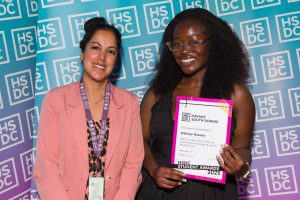 Whitney Masoka and her certificate. 