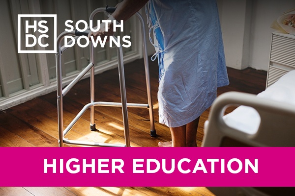 an elderly person using a zimmer frame