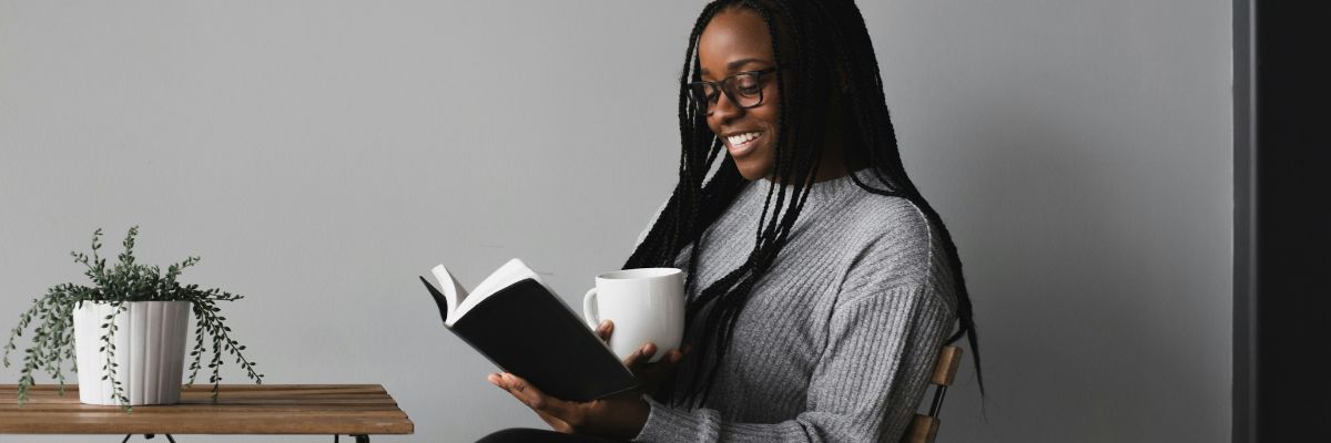 student reading a book, english gcse