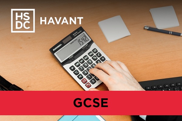 Closeup of someone using a calculator