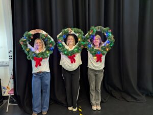 The ALS team at Alton College with their festive wreath jumpers. 