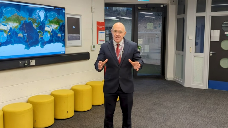 Kurt Hintz, our Interim Principal and CEO standing in front of the HSDC Space and Satellite Hub at Alton College.