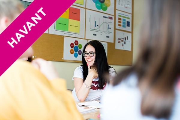 a student with their classmates in class