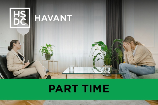 two people sat opposite each other in a counselling session