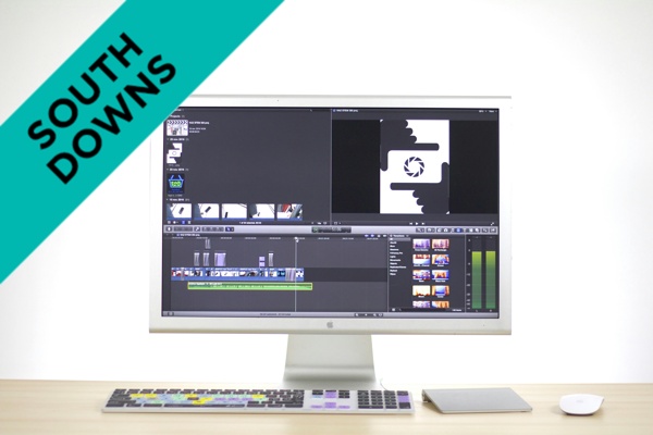 A computer showing video editing software.