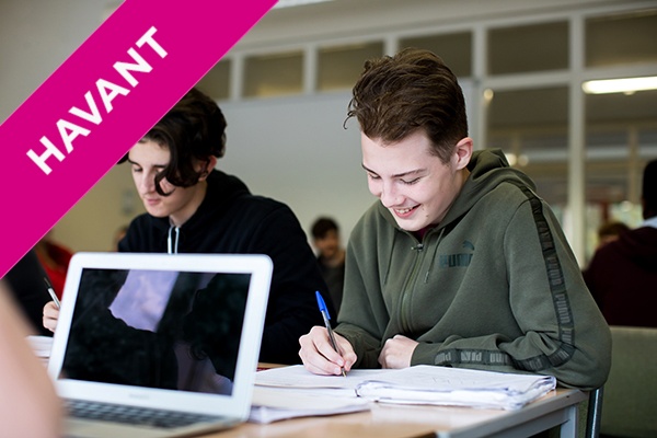 two students working together in class