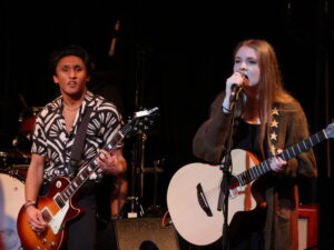 Two Alton music students with guitars.