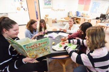 Students working with toys in our Early Years classroom.