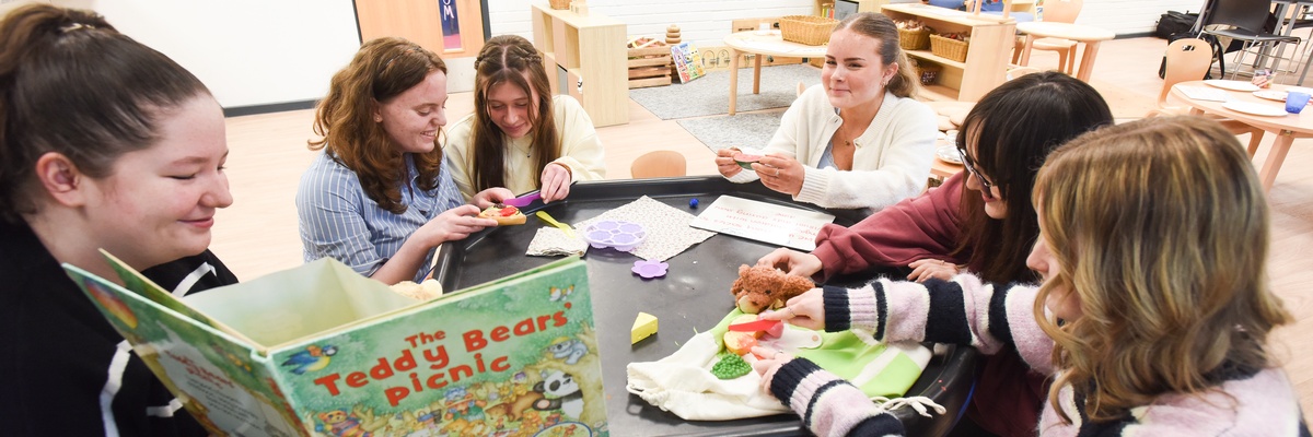 Students working with toys in our Early Years classroom.