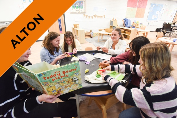 Students working with toys in our Early Years classroom.