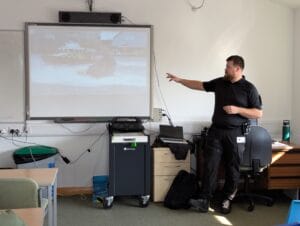 Ministry of defence police giving a talk at the public services careers event at South Downs College.